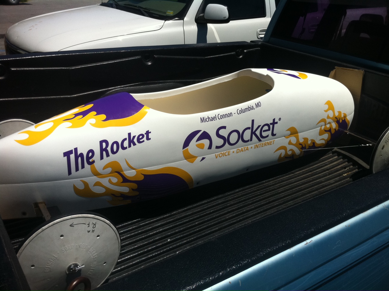socket derby car in a truck bed