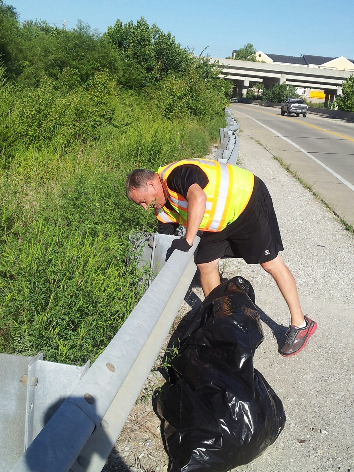 Employee picks up trash